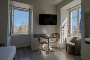 Appartements Le Relais de l'Orangerie : photos des chambres