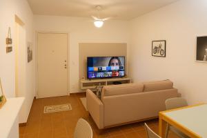 Praia a pé e piscina