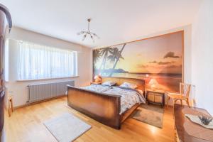 Maisons de vacances Le Gite de la Fontaine - A 30min de Bale : photos des chambres