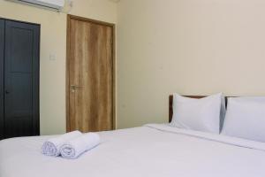 Fully Furnished with Comfortable Design 1BR Apartment at Pejaten Park Residence By Travelio