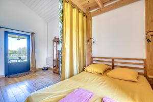 Maisons de vacances Lodge evasion fleurie st Emilion : photos des chambres