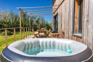 Maisons de vacances Lodge evasion fleurie st Emilion : photos des chambres