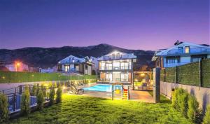 Fethiye Ölüdeniz Ovacık 4 oda 1 salon 8 kişilik tatil villası