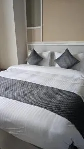 The Trot Hotel & Suites near Yashobhoomi Udyog vihar - Dhankot