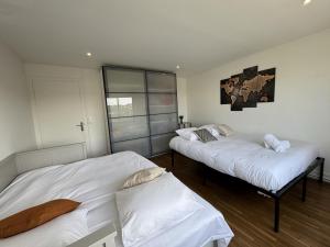 Maisons de vacances Le Maki - 10 pers - Reve au Mans : photos des chambres