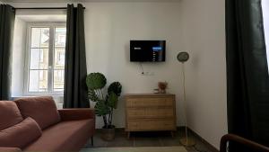 Appartements Le Petit Oasis - 50m de la gare de Nevers : photos des chambres