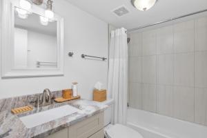 Immaculate condo near beach with lanai and pool also tennis