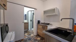 Appartements Studio Machy - Centre-Ville et Parking Gratuit : photos des chambres