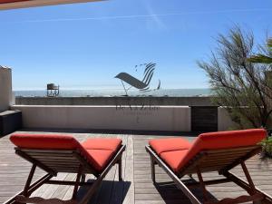 Maisons de vacances Mer & Soleil - Face mer avec acces direct plage : photos des chambres