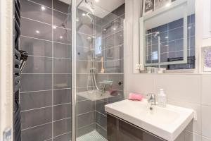 Maisons de vacances Villa Grenadine - Climatisee avec piscine : photos des chambres