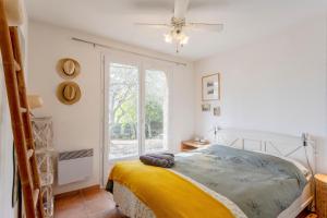 Maisons de vacances Villa Grenadine - Climatisee avec piscine : photos des chambres