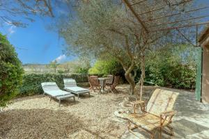 Maisons de vacances Villa Grenadine - Climatisee avec piscine : photos des chambres