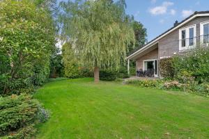 Huis Specht is perfect voor vakantie nabij meer en tuin op zuiden