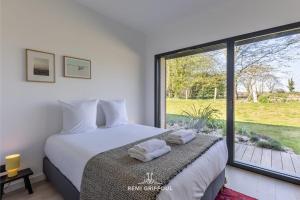 Maisons de vacances L-Elegance 115 m 4 2 guests Design & Nature : photos des chambres