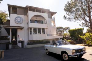Hotels Hotel 202 : photos des chambres