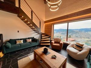 Chalets Le Venerable, 4 etoiles, vue imprenable au coeur des Vosges : photos des chambres