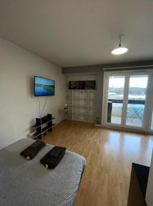 Appartements Geneva Residences - Colourful Apartment by the border : photos des chambres