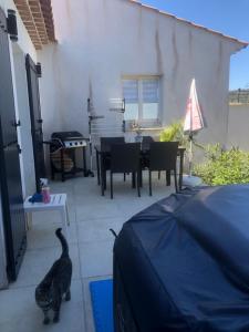 Villas T2 aile de villa et Spa-jacuzzi prive et illimite et plateau d'acceuil offert! : photos des chambres