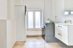 Appartements le refuge fleuri T5 avec terrasse et jardin : photos des chambres