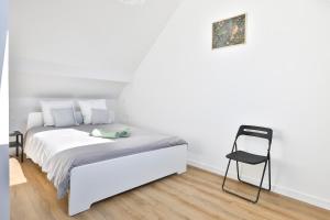 Appartements le refuge fleuri T5 avec terrasse et jardin : photos des chambres