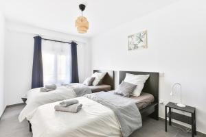 Appartements le refuge fleuri T5 avec terrasse et jardin : photos des chambres
