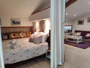 Appartements La Grange Du Moulin De Tauran : photos des chambres