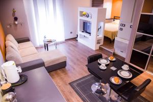 Appartements OIQIA • Launaguet : photos des chambres