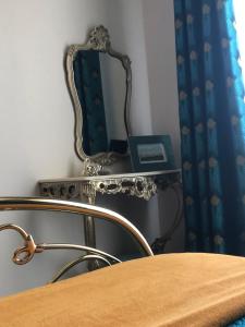 Villas T2 aile de villa et Spa-jacuzzi prive et illimite et plateau d'acceuil offert! : photos des chambres
