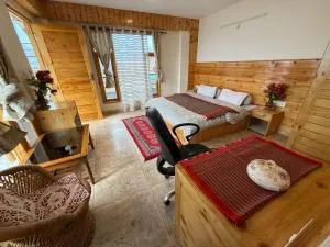 Luxury 1 BHK Apartment for Rent in Naggar,Manali with Modern Kitchen, Wooden Interior, and Spacious Bathroom - Nagar