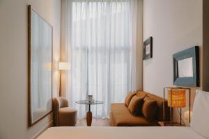 Triple Room room in Hotel Pulitzer Barcelona