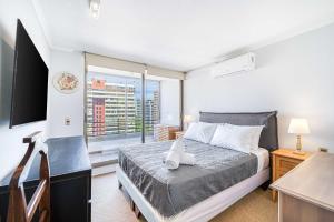 Castaño Home - AC & Estacionamiento en la Ciudad