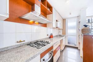 Castaño Home - AC & Estacionamiento en la Ciudad