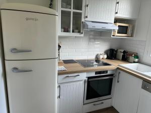 Maisons de vacances Le Temps de Vivre - Maison avec jardin proche Deauville : photos des chambres