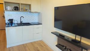 Mechelinki, Apartament z ogródkiem, widokiem na morze i aneksem kuchennym