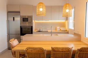 Son Bou Sunset Villas By MENORCARENTALS