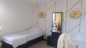 Confortable habitación en apartamento familiar en el Prado