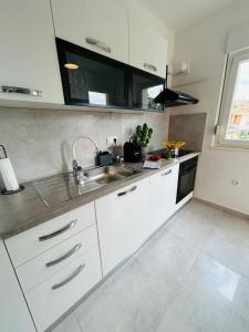 Apartments by the sea Marina, Trogir - 24180