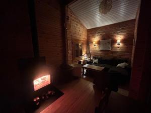 Maisons de vacances Chalet en bois sur grand parc arbore tout proche de l ocean : photos des chambres