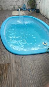 Casa com piscina e ar condicionado