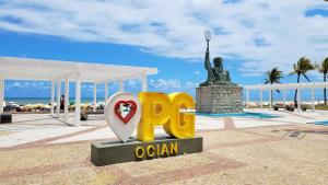 Kitnet WIFI na Praia Grande - Pleno centro da Ocian