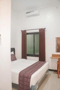 RR -2 Syariah Hotel SLG