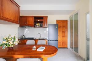 CandlePine Suites - Khách sạn căn hộ