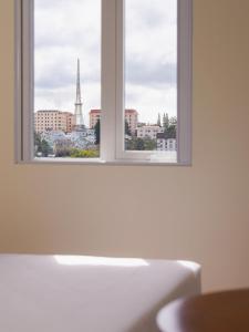 CandlePine Suites - Khách sạn căn hộ