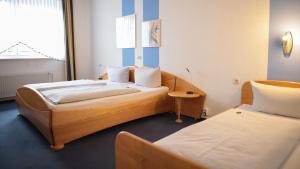 Triple Room room in Garni Hotel Hof zum Ahaus