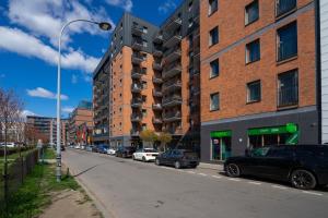 National Stadium Riverside Apartment by BookingHost