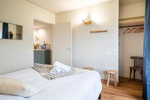 Appartements MonAppart-Hotel - Appartement Lumineux avec Clim et Parking : photos des chambres