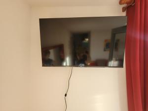 Appartements La Maison Bleue, village vacances, piscine, parking : photos des chambres