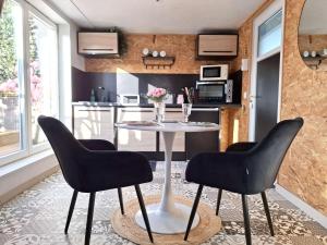 Appartements Le Ti-Cocoon Studio en Rez-de-Jardin : photos des chambres