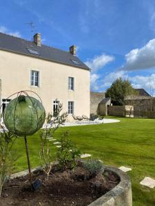 Maisons de vacances Maison au coeur d'une ancienne ferme a BAYEUX : photos des chambres