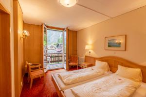 Double Room with Balcony and Waterfall View room in Hotel Staubbach